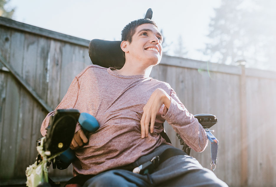 Image a young man in a wheelchair